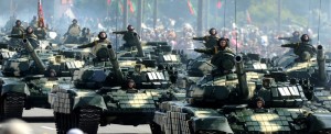 A column of Belarussian Army tanks rolls in central Minsk, on July 3, 2012, during a military parade to mark the nation's Independence Day. AFP PHOTO / VICTOR DRACHEV (Photo credit should read VICTOR DRACHEV/AFP/GettyImages)